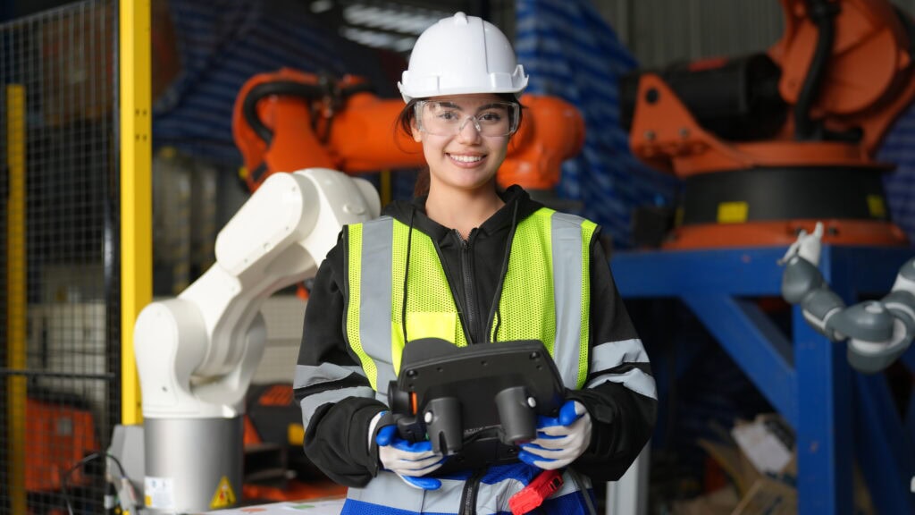 Robotic Arm engineer check on equipment in its with software of an Artificial Intelligence Computer Processor Unit