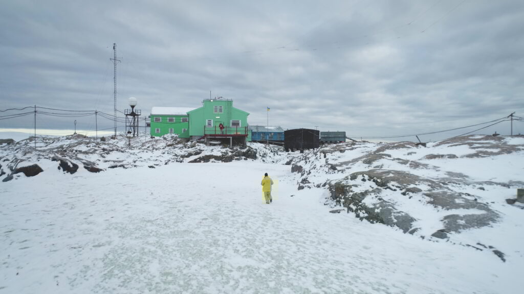 Man running polar research station on Antarctica coastline