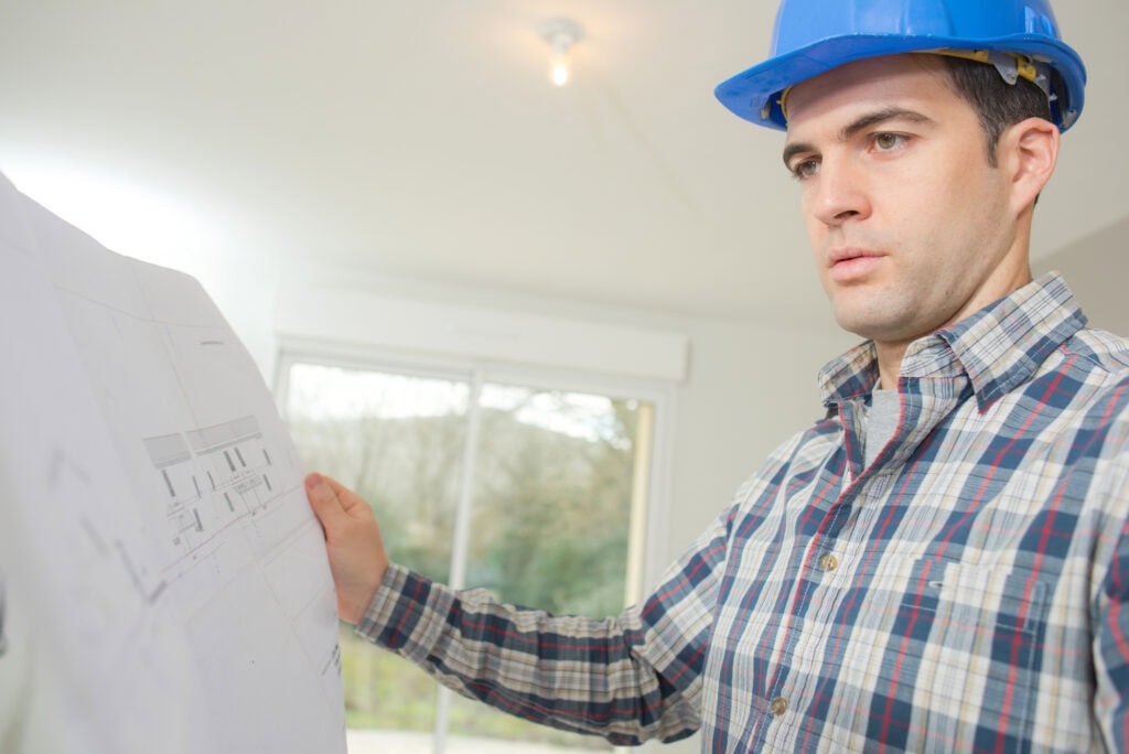 Architect holding a floorplan