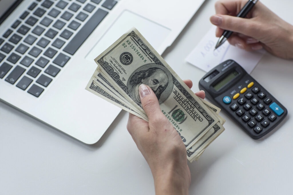 Woman is calculating her money