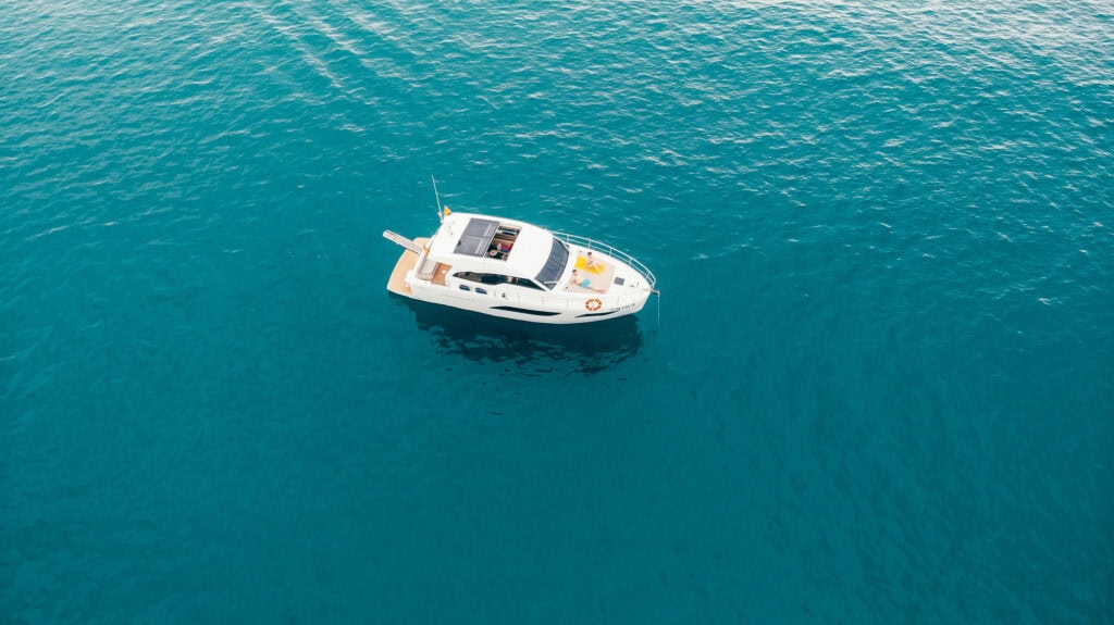 Amazing aerial view of yacht in sea