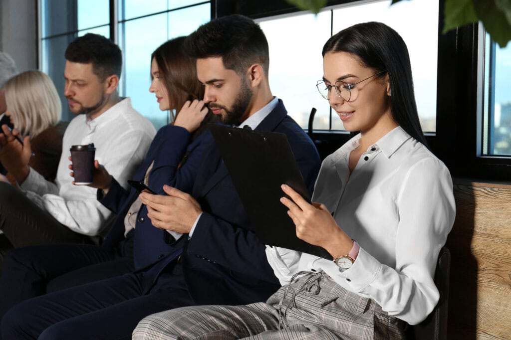 Employees using phone while in the meeting