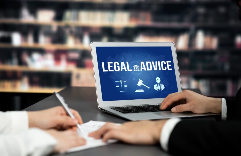 Smart legal advice website for people searching for astute law knowledge in laptop computer on a desk in library of university or college