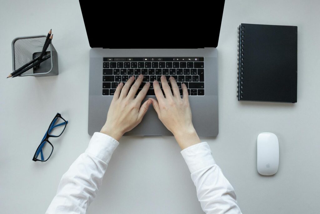 Top View of a Man Using Laptop