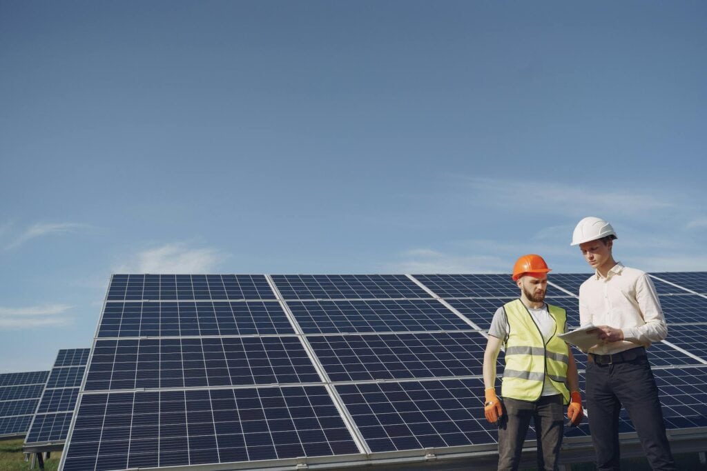 Electricians Inspecting the Solar Panels