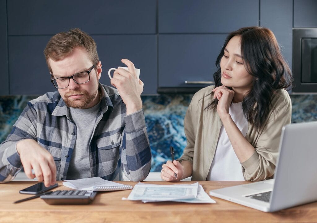 Couple checking insurance