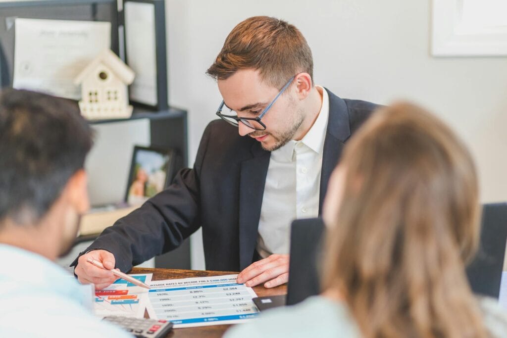 Real Estate Broker Discussing with clients