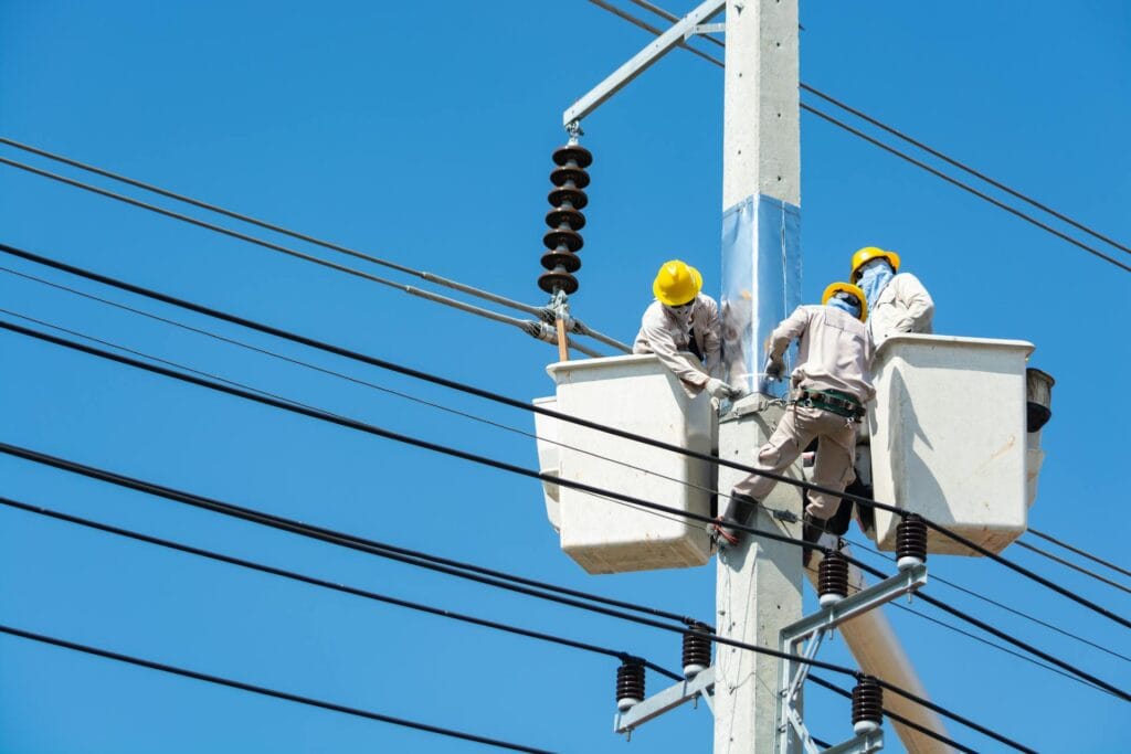 Electricians Working with Power Lines