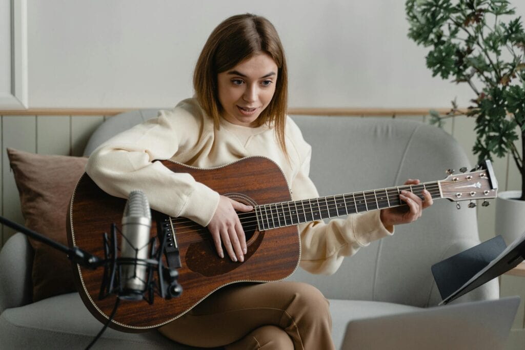 A Woman Playing Guitar