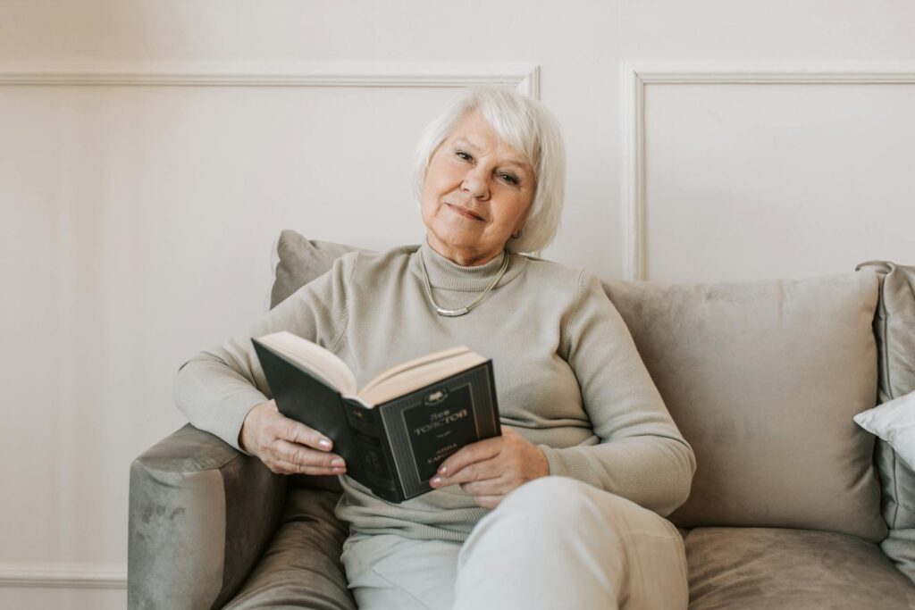 Elder Woman sitting on a couch