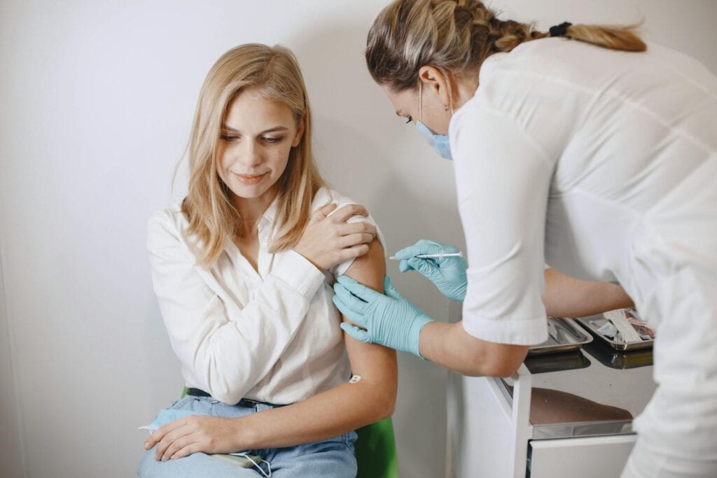 A Woman Getting an Injection