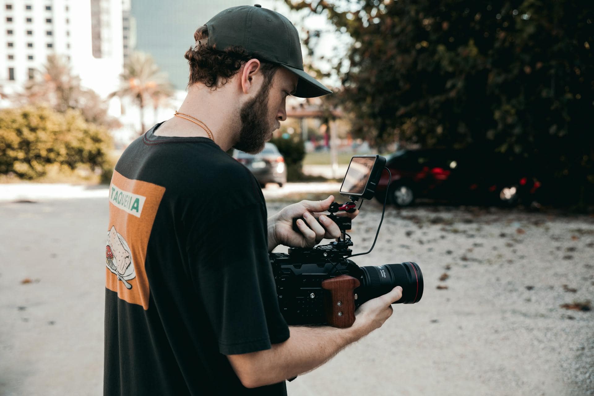Man Filming Using Camera