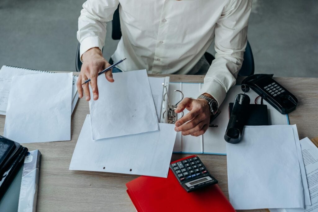 Documents on a Man's Desk