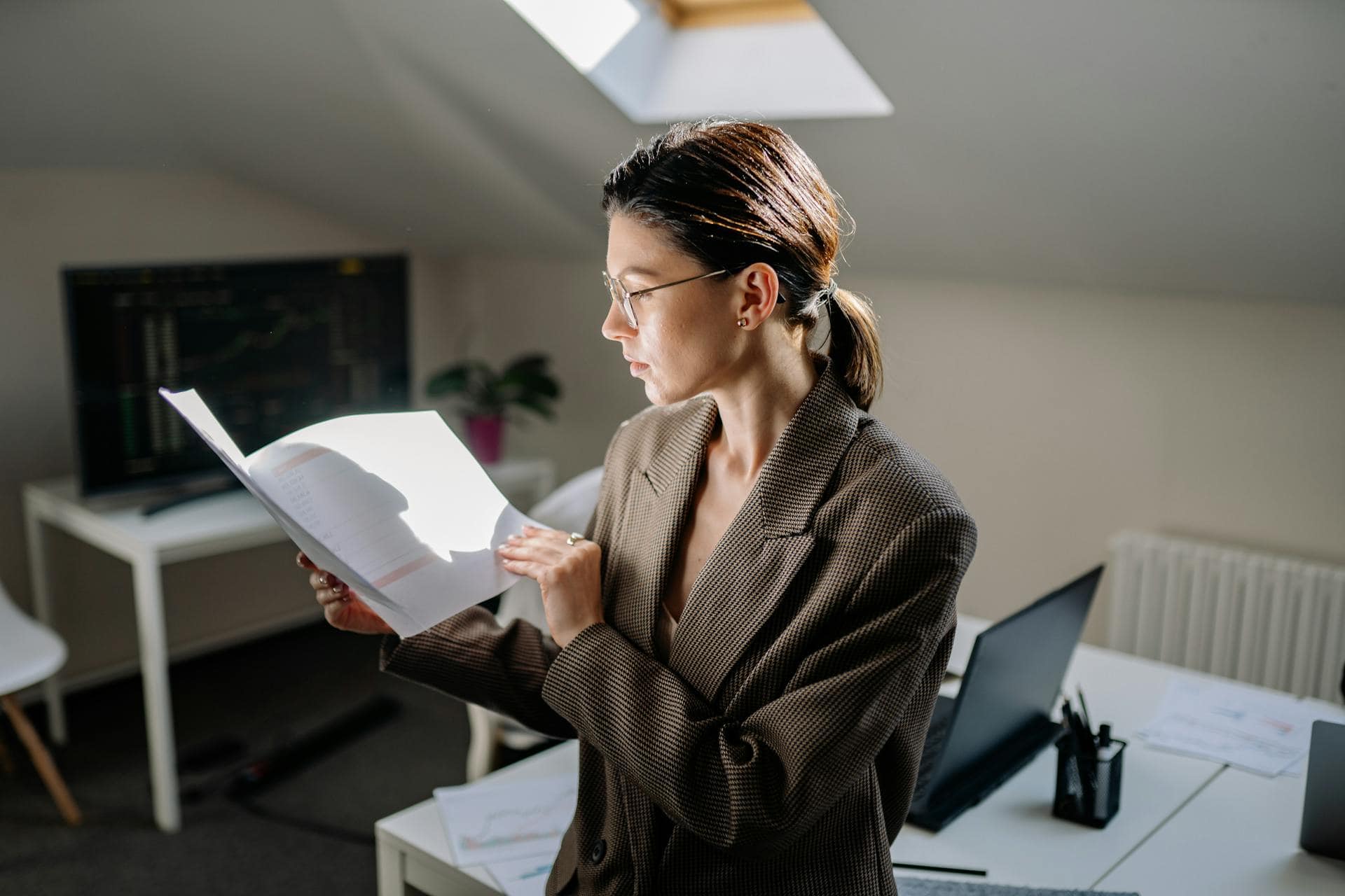 A Woman Looking the Papers